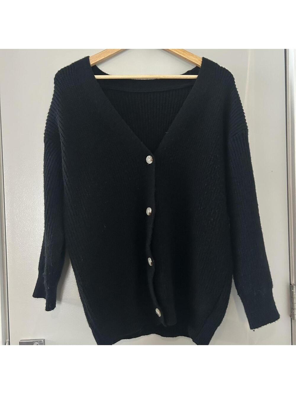 Black cardigan with button front and ribbed cuffs